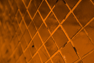 Beautiful closeup textures abstract tiles and gold color glass wall background and art wallpaper