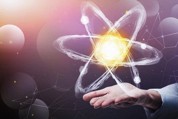 Man hand holding atom hologram