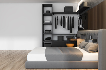 White and wooden master bedroom with wardrobe
