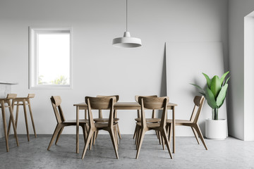 White dining room and kitchen interior