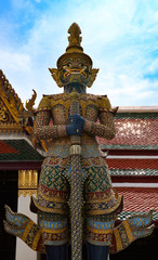 Obraz premium Wat Phra Kaew or Temple of Emerald Buddha, Guardian statues and Grand palace located within the grounds of the Grand Palace in Bangkok is Thailand’s most sacred temple and pilgrimage site for Thai