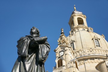 Fototapeta na wymiar Frauenkirsche Church of Our Lady Dresden with Statue of Martin Luther in the Front