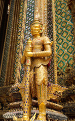 Wat Phra Kaew or Temple of Emerald Buddha, Guardian statues and Grand palace located within the grounds of the Grand Palace in Bangkok is Thailand&rsquo;s most sacred temple and pilgrimage site for Thai