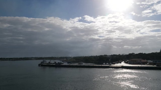Departure from the Puerto Princesa port with ferry to Coron at sunrice