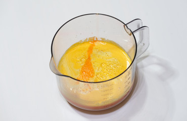 Modern electric juicer  various fruit and glass of freshly made juice  healthy lifestyle concept