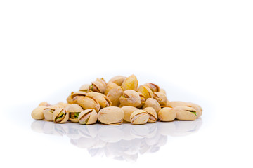 Pistachios on a white background . Pistachio nuts