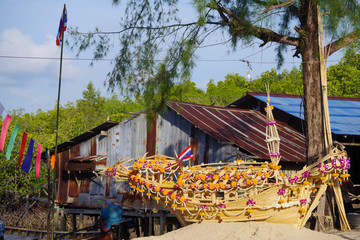 A miniature boat in floating ceremony 