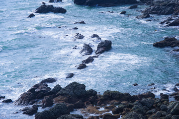 Wave hitting rock at rock Bay Ko Lanta island Krabi Thailand