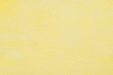 yellow watercolor painted on paper  background texture macro