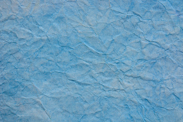 blue creased pastel paper background texture