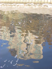 Building reflection in the river water