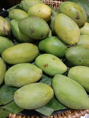 Raw mangoes for sale