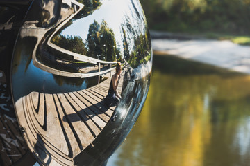 Reflection of a girl in a visor helmet