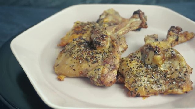 Grilled chickhen legs marinated with salt, pepper and mint