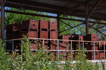 Old rusty metal containers and boxes