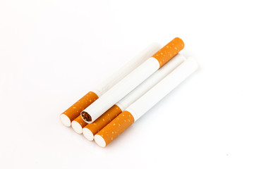 Tobacco smoking. Cigarette close up, isolated on white background.  Bad habit. Nicotine. Drug addiction. Cancer.