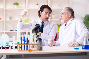 Two chemists working in the lab 