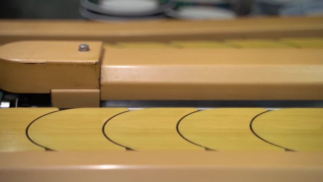 Empty moving belt in Japanese restaurant in Japan. Seen in close up view in slow motion footage. Japanese famous food concept.
