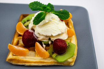 Berry dessert on a white background. Lunch with dessert on the street. Sweet dessert Berry dessert. waffles with ice cream. copy space