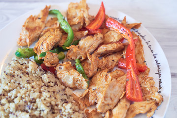 Seitan vegan chicken fillet with quinoa and organic peppers