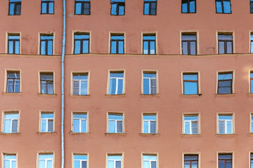 Fototapeta premium Distorted reflection of the building in the water