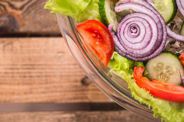 Fresh sliced salad of different vegetables close - up