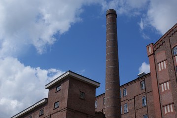 Fototapeta na wymiar old brick chimney of factory