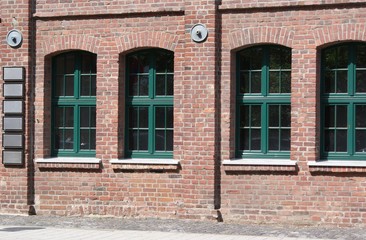 old brick wall with windows industrial factory