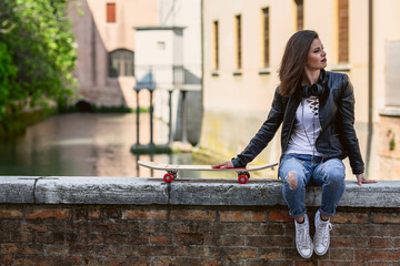 Young  woman with his longboard