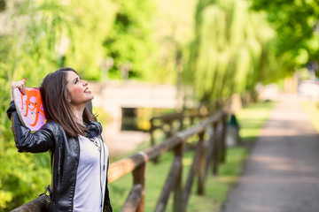 Naklejka premium Young woman with his longboard