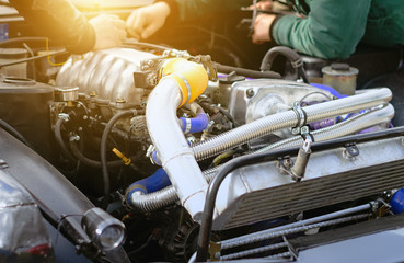 car service masters solve the problem of the work of the electrics in the engine for its further successful operation