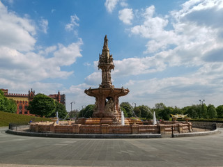 Fototapeta na wymiar Doulton fountain in Glasgow Green built in 1888 and shown at the international exhibition