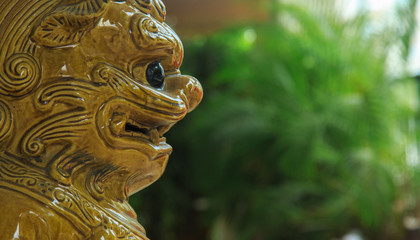 ceramics lion guardian statue closeup