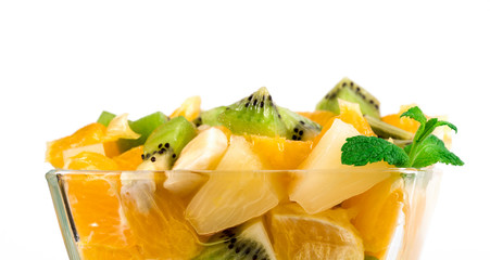 Fototapeta na wymiar Bowl of healthy fresh fruit salad on white background