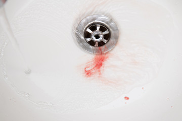 blood in basin,blood and washbasin in bath room,concept blood and basin in bath room,