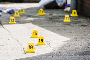 Numbered cones mark evidence a bomb explodes.