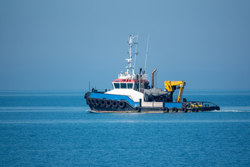 The sea tug comes out of the harbor