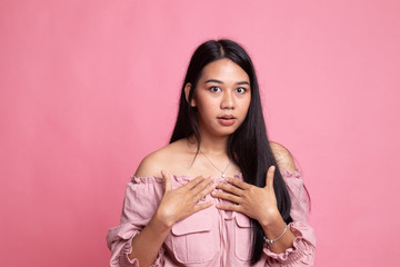 Shocked young Asian woman.