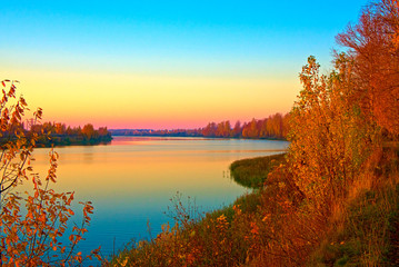 Fantastic beauty sunset on the Kostroma River in the fall. Kostroma, Russia.