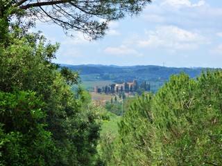 Fototapeta na wymiar An Ancient Church on a Hill in Tuscany Italy