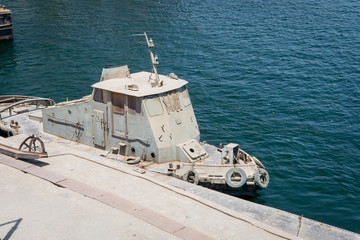 Military boat on the shore of the Nile river. Egypt. April 2019
