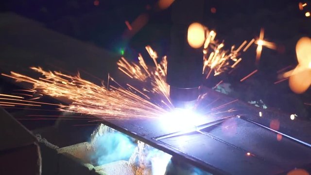 Laser CNC machine. Cut sheet metal at workshop. Programmable highly accurate machine. Automatic work for ironwork. Plasma cutting of metal.