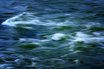 Beauty of blue and green flowing water