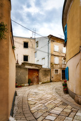 Fototapeta na wymiar Narrow Street in the idyllic old town of Porec in Croatia