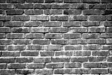 Black and white brick. Old brick wall, old texture of red stone blocks closeup. Wall texture.Copy space.