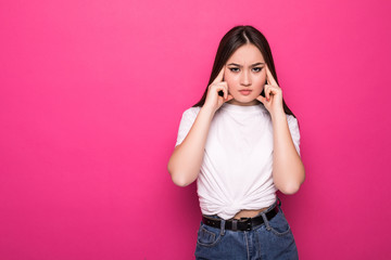 Young pretty asian woman with sad emotions isolated on pink background