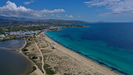 defaultAerial drone photo of breathtaking turquoise sandy beach of Agios Prokopis, Naxos island, Cyclades, Greece