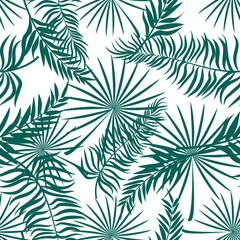 Seamless pattern made with green silhouettes of tropical leaves on white background. Tropic folage texture.Vector flat illustration