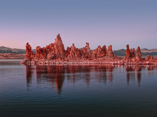 Glowing rocks at colorful sunset on Mono Lake in the Eastern Sierras