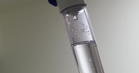  saline IV drip dropper at clinic